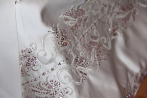 Jai International 'Rose Pink' size 4 new wedding dress close up of material