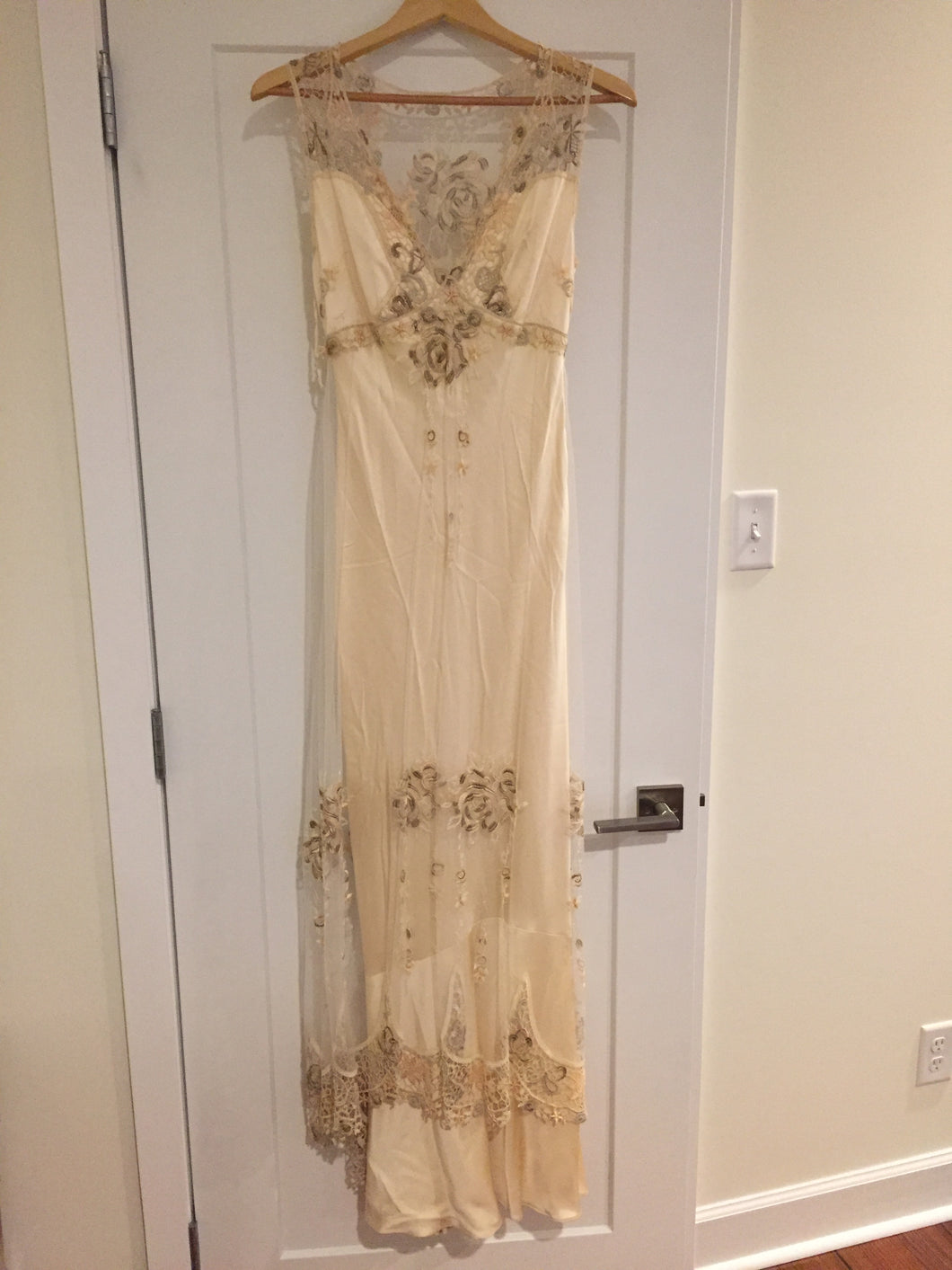 Clarie Pettibone 'Custom' size 6 used wedding dress front view on hanger