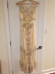Clarie Pettibone 'Custom' size 6 used wedding dress back view on hanger
