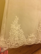 Load image into Gallery viewer, Alessandra Rinaudo &#39;Colet&#39; size 4 used wedding dress view of hem
