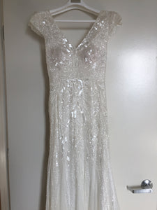 Rosa Clara 'Ubela' size 2 used wedding dress front view on hanger