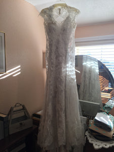 Allure Bridals '8764' size 8 used wedding dress front view on hanger