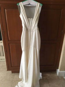Kenneth Pool 'Faith' size 4 used wedding dress back view on hanger