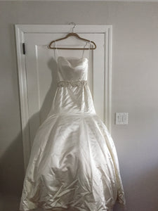 Casablanca '079' size 8 used wedding dress front view on hanger