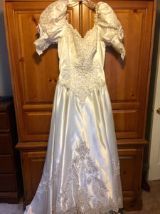 Mori Lee 'Princess' size 12 used wedding dress front view on hanger