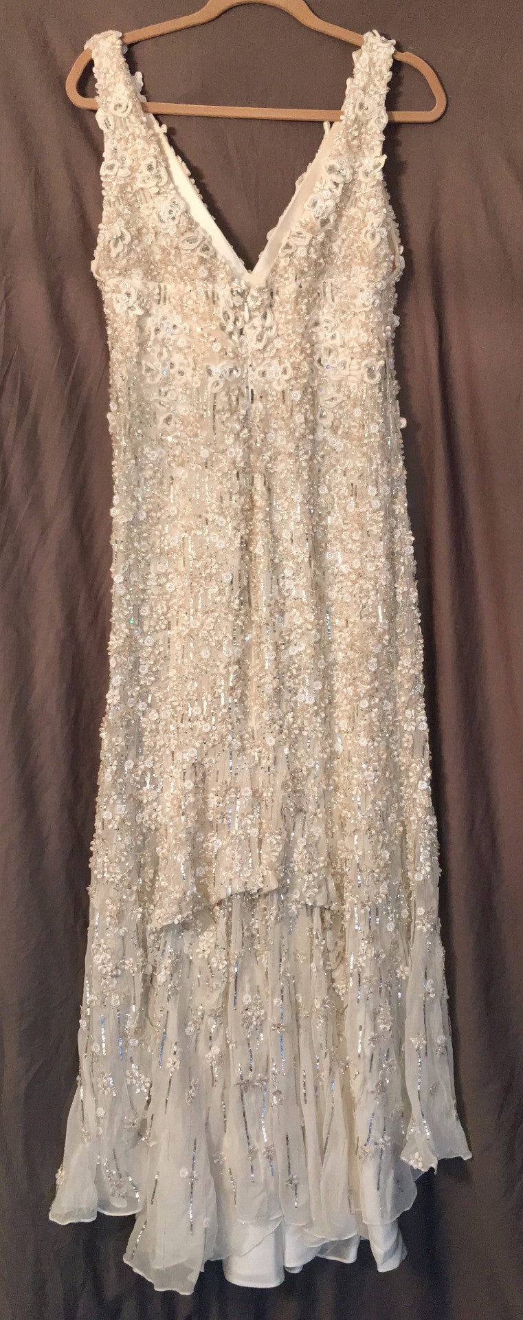 Monique Lhuillier 'Chandler' size 8 used wedding dress front view on hanger