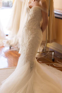 Custom 'Blinova Bridal' size 8 new wedding dress side view on bride