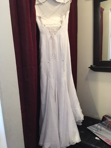 Moonlight 'Elegant' size 6 used wedding dress back view on hanger