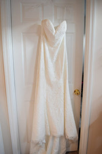 Alvina Valenta 'Ti Adora' size 6 used wedding dress front view on hanger
