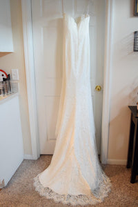 Alvina Valenta 'Ti Adora' size 6 used wedding dress back view on hanger