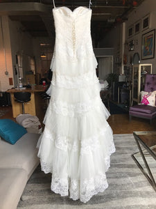Mia Solano 'M424C' size 6 sample wedding dress back view on hanger