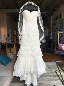 Mia Solano 'M424C' size 6 sample wedding dress front view on hanger