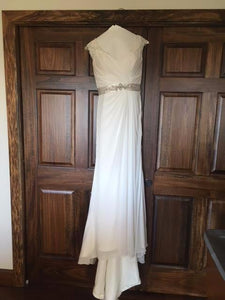 Maggie Sottero 'Crystal Capped Sleeves' size 8 sample wedding dress front view on hanger
