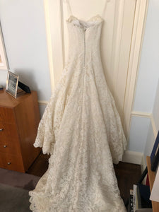 Vera Wang 'Jessica Simpson Dress' size 4 used wedding dress back view on hanger