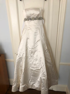 Vera Wang 'Ivory' size 4 used wedding dress front view on hanger