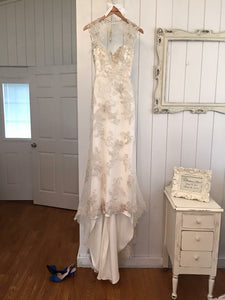 Maggie Sottero 'Jade' size 2 used wedding dress front view on hanger