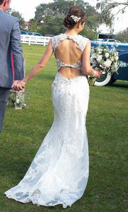Maggie Sottero 'Jade' size 2 used wedding dress back view on bride
