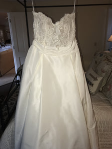 Anne Barge 'Enchanted' size 12 used wedding dress front view close up on hanger