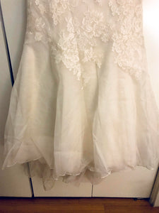 Victoria Nicole 'Classic' size 12 used wedding dress view of hemline
