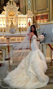 Lazaro '3201' size 6 used wedding dress side view on bride