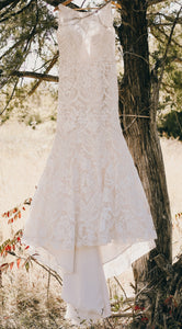 Eddy K '1021' size 12 used wedding dress back view on hanger