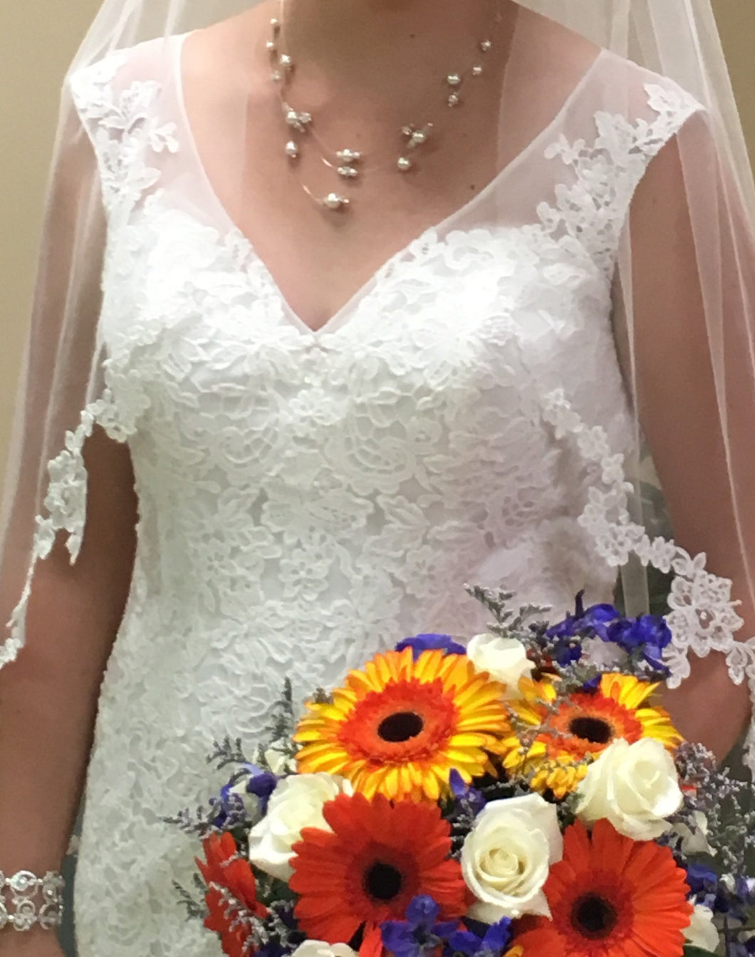 Mori Lee 'Madeline Gardener' size 10 new wedding dress front view on bride