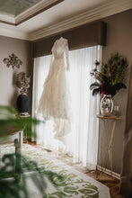 Load image into Gallery viewer, Martina Liana &#39;Romantic&#39; size 8 used wedding dress front view on hanger
