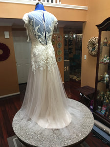 Maggie Sottero 'Sundance' size 8 used wedding dress back view on mannequin