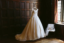 Load image into Gallery viewer, Mandy &#39;Princess&#39; size 0 used wedding dress front view on hanger
