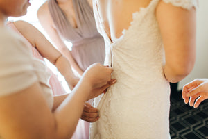 Romona Keveza 'Kona-Alencon Lace' size 4 used wedding dress side view close up on bride