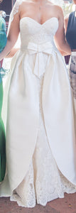 Rosa Clara 'Obadia VD ENCAJE NUDE' size 10 used wedding dress front view on bride