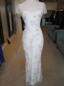 Reem Acra 'Over the Moon' size 10 used wedding dress front view on mannequin