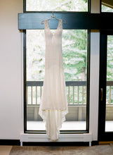 Load image into Gallery viewer, Daalarna &#39;Sensuous&#39; size 2 used wedding dress front view on hanger
