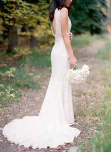 Daalarna 'Sensuous' size 2 used wedding dress side view on bride