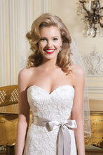 Load image into Gallery viewer, Justin Alexander &#39;Lace&#39; size 12 sample wedding dress front view close up on model
