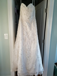Justin Alexander 'Lace' size 12 sample wedding dress front view on hanger