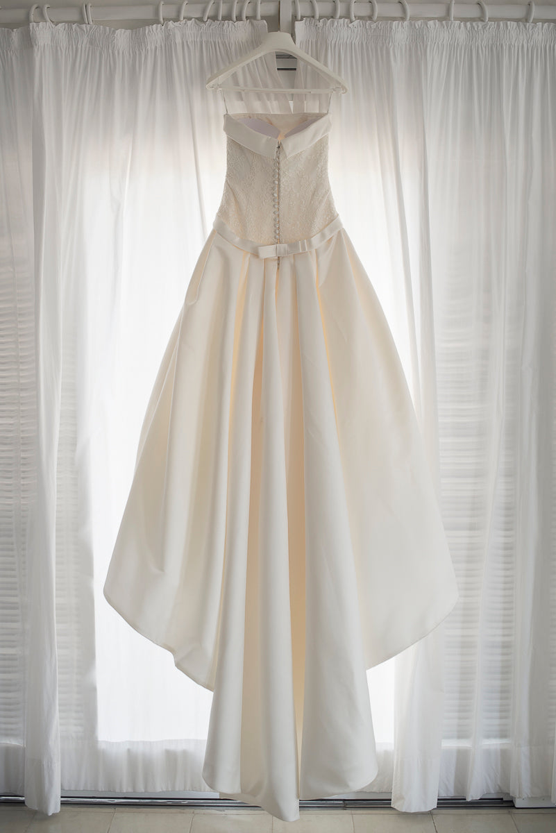 Pronovias 'Barcli' size 6 used wedding dress back view on hanger