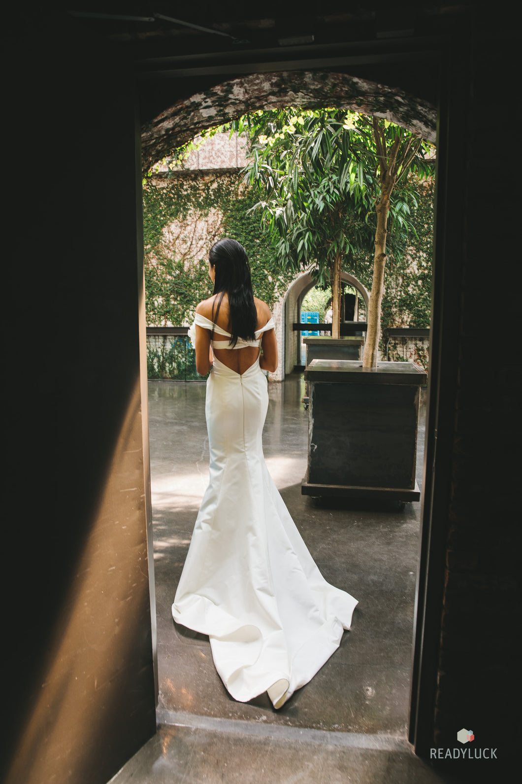 Austin Scarlett 'Eden' size 4 used wedding dress back view on bride