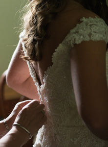 Maggie Sottero 'Saffron' size 6 used wedding dress side view on bride