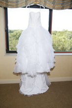 Load image into Gallery viewer, Oleg Cassini &#39;Strapless Ruffled&#39; size 2 used wedding dress front view on hanger
