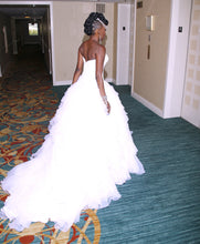 Load image into Gallery viewer, Oleg Cassini &#39;Strapless Ruffled&#39; size 2 used wedding dress side view on bride
