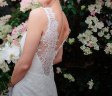 Load image into Gallery viewer, Carolina Herrera &#39;Daisy&#39; size 2 used wedding dress back view on bride
