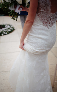 Carolina Herrera 'Daisy' size 2 used wedding dress back view on bride