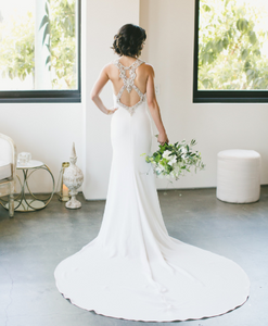 Pronovias 'Emmett' size 0 used wedding dress back view on bride