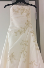 Load image into Gallery viewer, Custom &#39;Georgette&#39; size 0 new wedding dress front view close up on hanger
