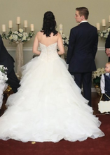 Load image into Gallery viewer, Oleg Cassini &#39;White&#39; size 2 used wedding dress back view on bride
