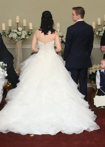 Oleg Cassini 'White' size 2 used wedding dress back view on bride