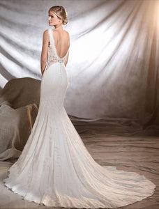 Pronovias 'Oreste' size 8 used wedding dress back view on model