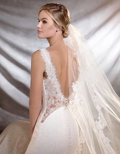 Pronovias 'Oreste' size 8 used wedding dress back view on model