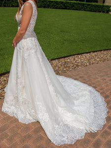 Maggie Sottero 'Alba' size 4 new wedding dress side view on bride